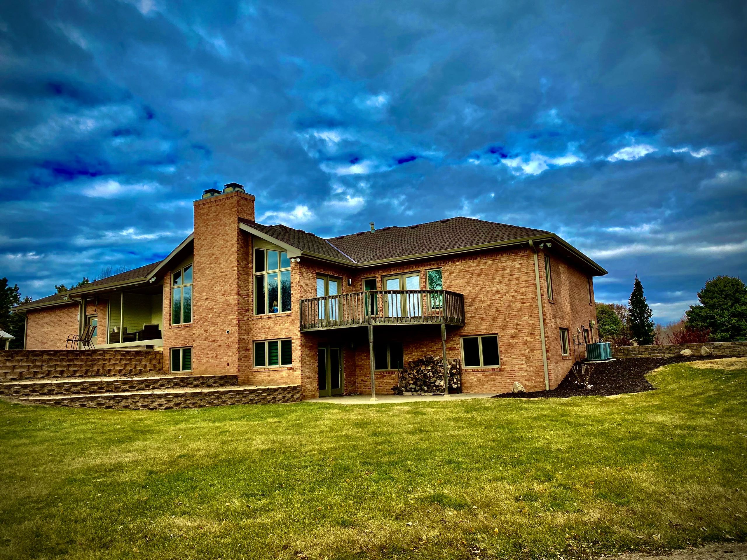 Brick and wood sided home on a spacious lot