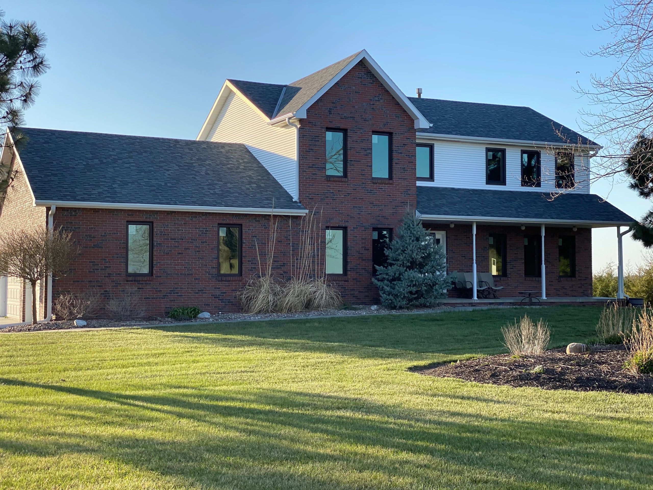 Two story brick home with updated exterior